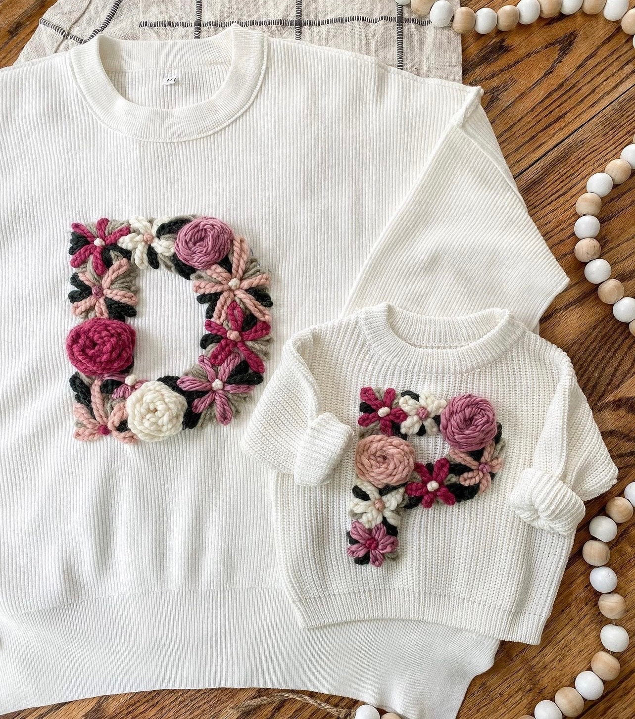 adult floral initial sweater